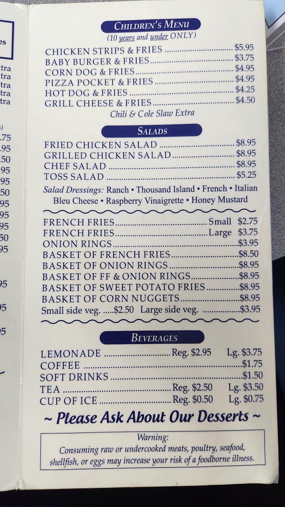 Food spread featuring grilled items and sides.